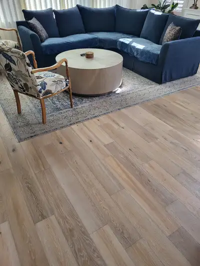Completed flooring installation: Hardwood living room
