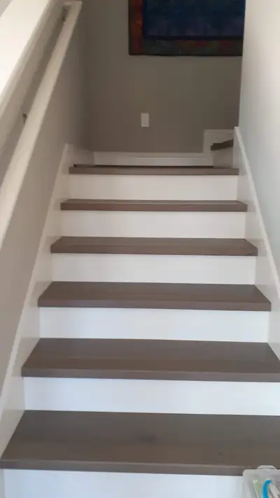 Completed flooring installation: Squared stairnose staircase