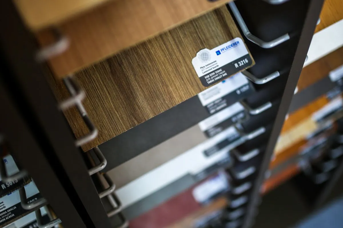 Warm tabac laminate flooring boards with realistic wood-look finish