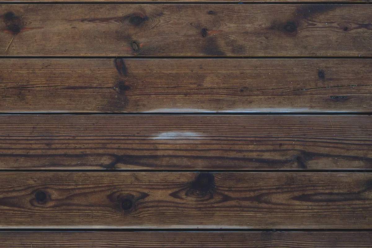 Rich brown hardwood planks showing deep grain texture and patterns
